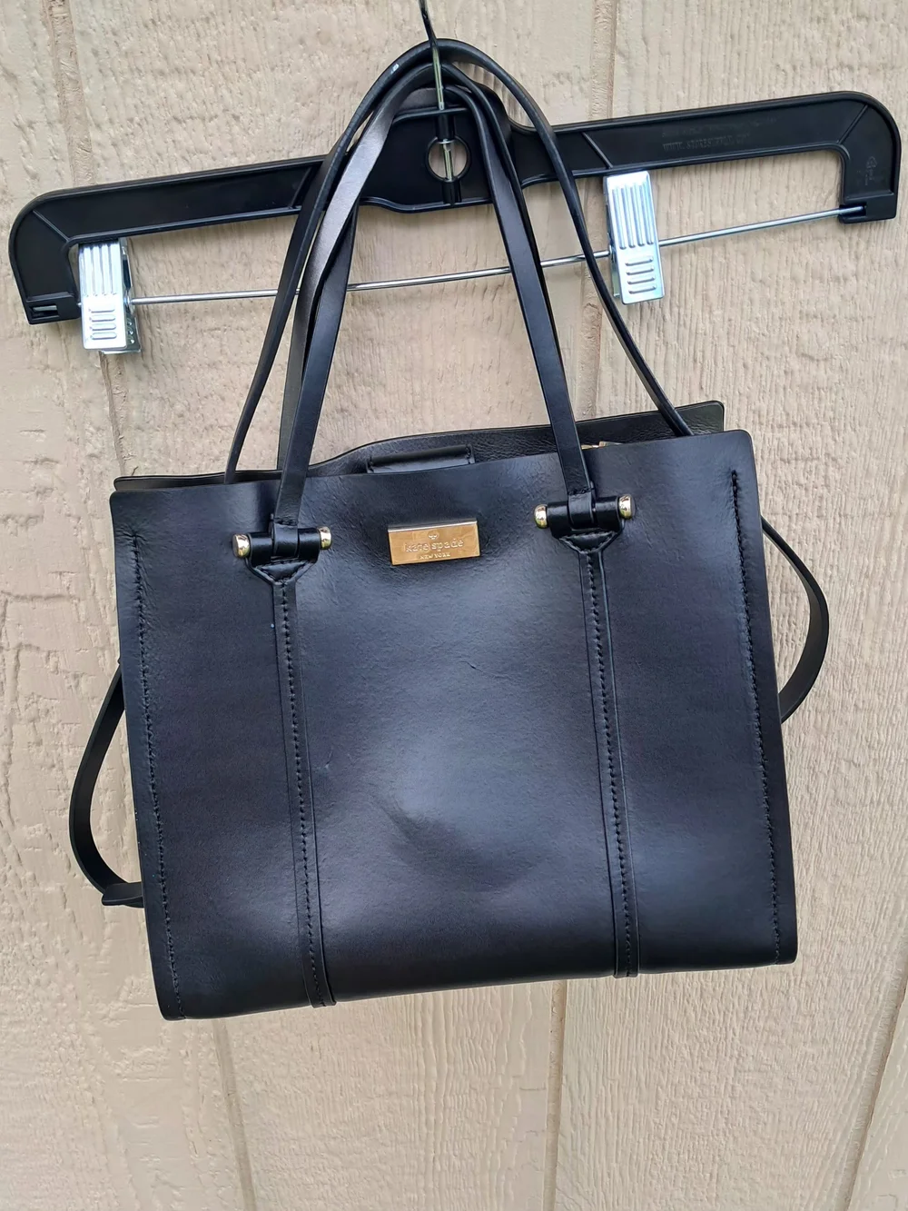 Kate Spade New York black leather tote bag with shoulder strap​